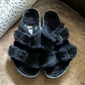 Black fur lined Birkenstocks